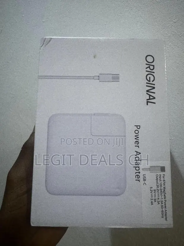 Original Macbook Charger 65w · Photo 1