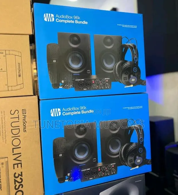 Presonus Studio Monitors, a Microphone, and an Audio Interface. · Photo 1