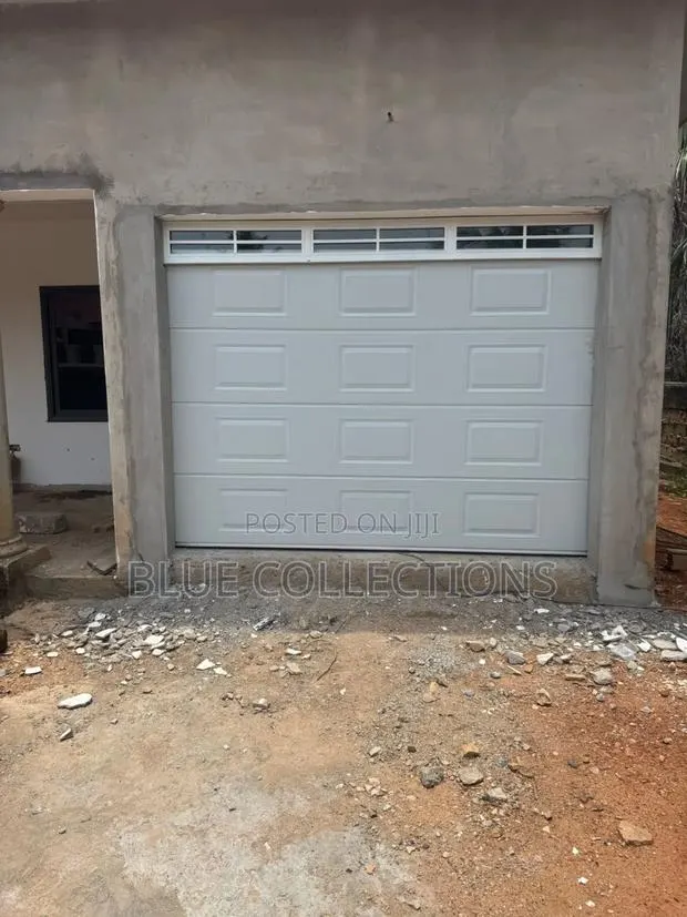 Garage Door With Fanlight · Photo 1