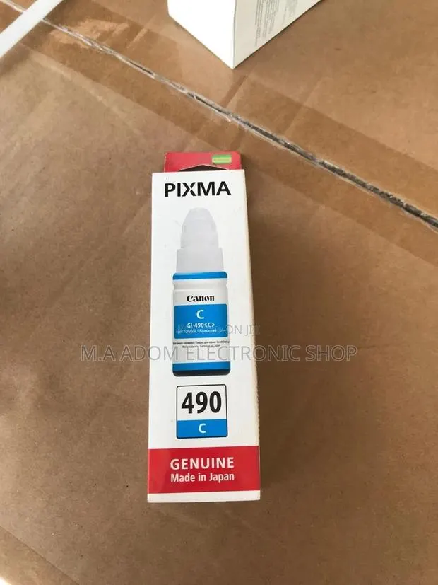 Canon GI-590 Ink Bottles: Your Colorful Printing Solution · Photo 1