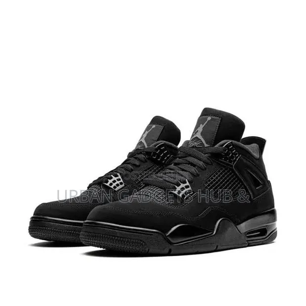 Jordan 4 Retro Black Cat · Photo 1