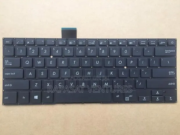 ASUS X405 Keyboard · Photo 1