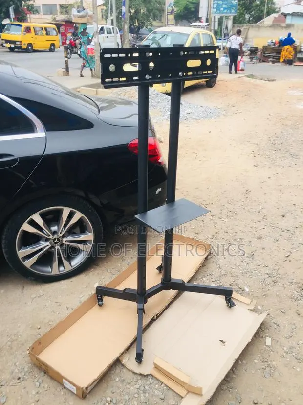 Movable Rolling TV Stand With Wheels (32-70) · Photo 1