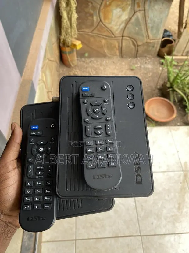 2 DStv Decoders With Remotes and Accessories · Photo 1