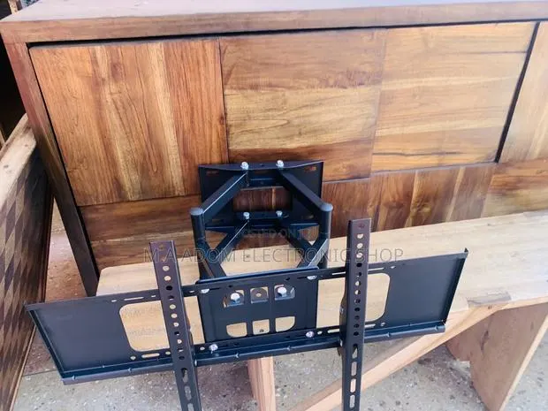 Affordable Full Motion TV Wall Mount for Most 32-75 Inch. · Photo 1