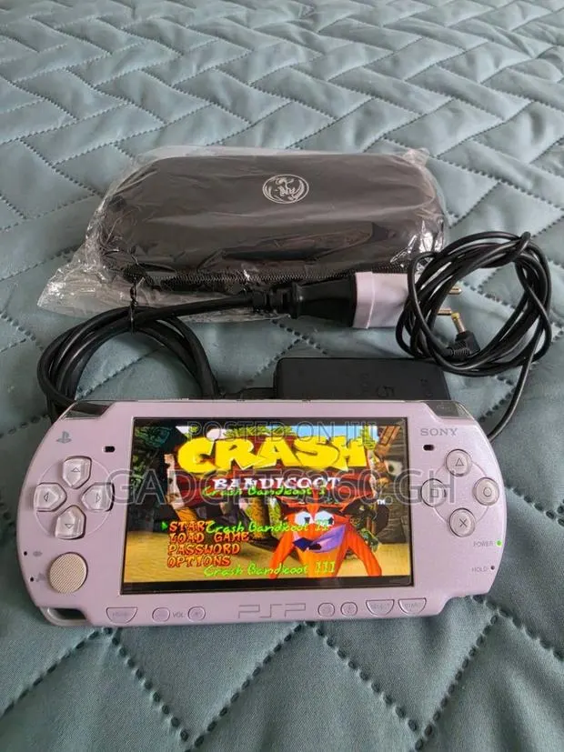 Sony PSP3000 (16GB + 10 Games) Light Pink · Photo 1