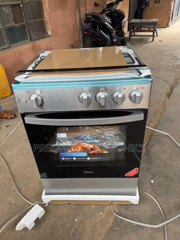 Midea 60x60cm 4 Burner Gas Cooker W/ Oven and Grill 24tmg4g081-S · Photo 1