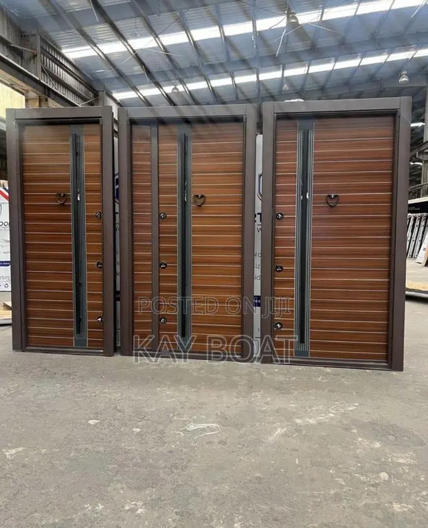 A Giant Door With 3 Central Locks Available · Photo 1