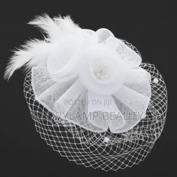 Elegant White Fascinator Hat–Hair Clip For Weddings And Formal Events · Photo 1