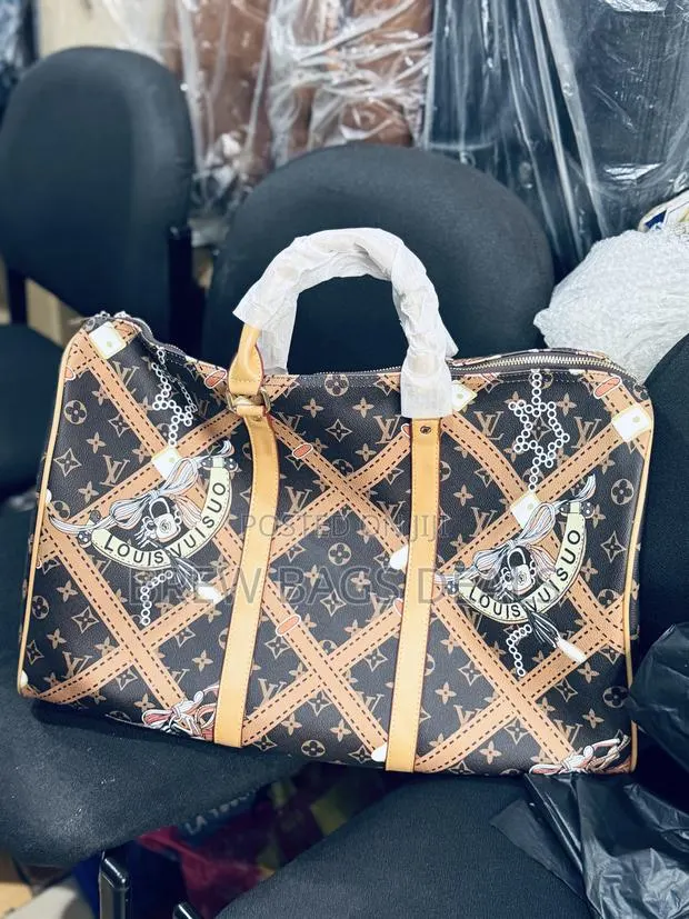 Premium Leather Louis Vuitton Duffle Traveling Bag. · Photo 1