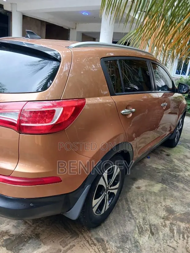 Kia Sportage EX 4dr SUV AWD (2.4L 4cyl 6A) 2011 Brown · Photo 1