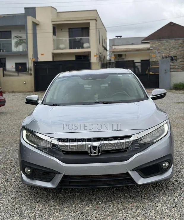 Honda Civic Touring 2dr Coupe (1.5L 4cyl) 2017 · Photo 1