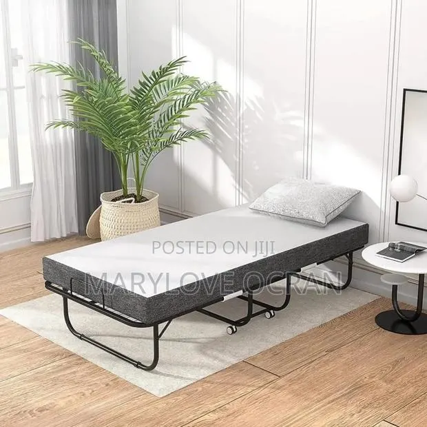 Foldable Bed Plus Mattress · Photo 1