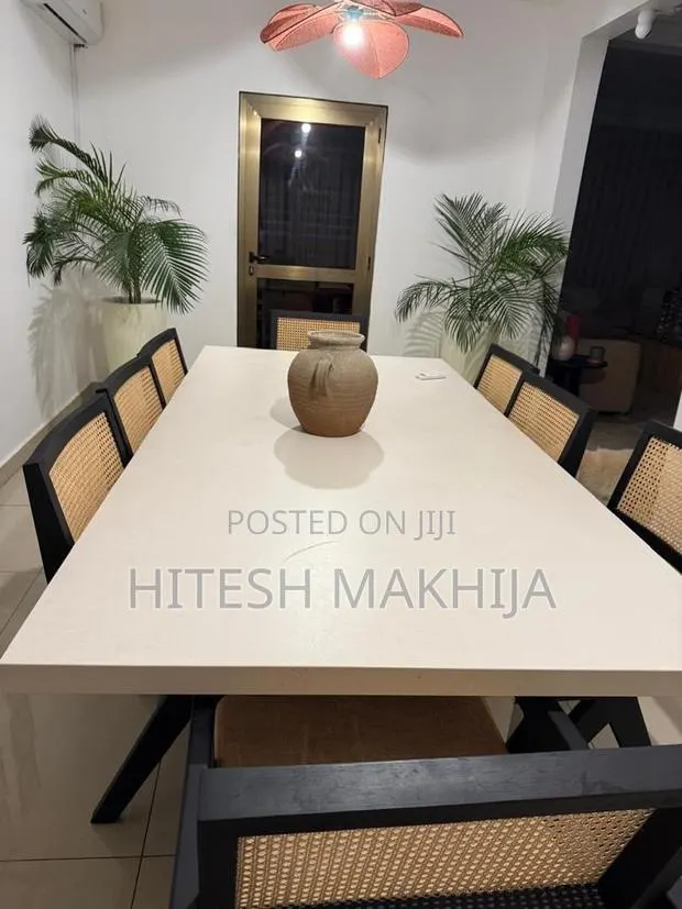 40% OFF Now Premium 8-Seater Dekton Dining Table + Cane Chairs · Photo 1