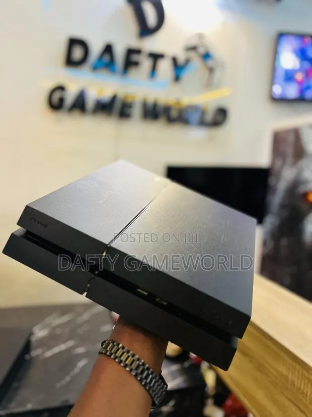 PS4 FAT WITH 2 Controllers and Loaded Games · Photo 1