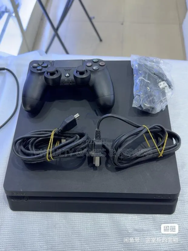 Ps4 Slim With 2 Controllers and 1tb Loaded With Games · Photo 1