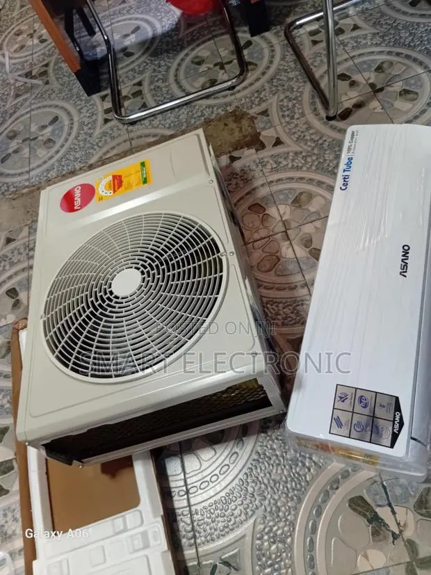 Asano 1.5hp High Efficiency Air Conditioner · Photo 1