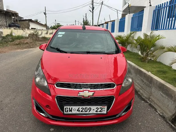 Chevrolet Spark LS 4dr Hatchback (1.2L 4cyl CVT) 2014 Red · Photo 1
