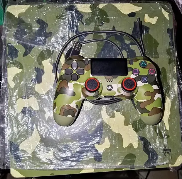 Play Station 4 Slim 1TB · Photo 1