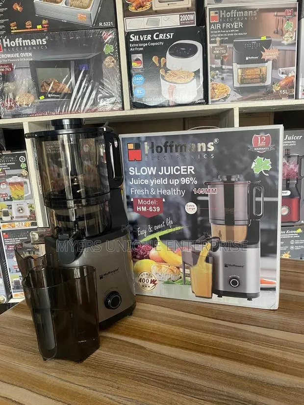 Versatile Hoffman Whole Slow Juicer With Two Cups · Photo 1