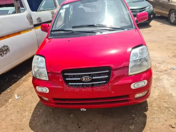 Kia Morning 2010 Red · Photo 1