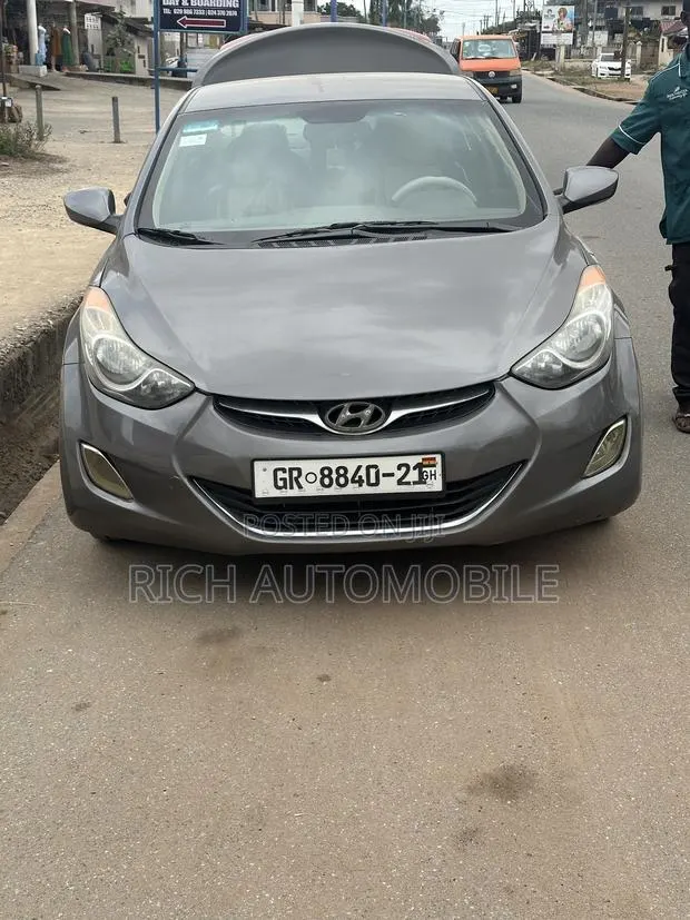 Hyundai Elantra GS Coupe FWD (1.8L 4cyl 6A) 2013 Gray · Photo 1