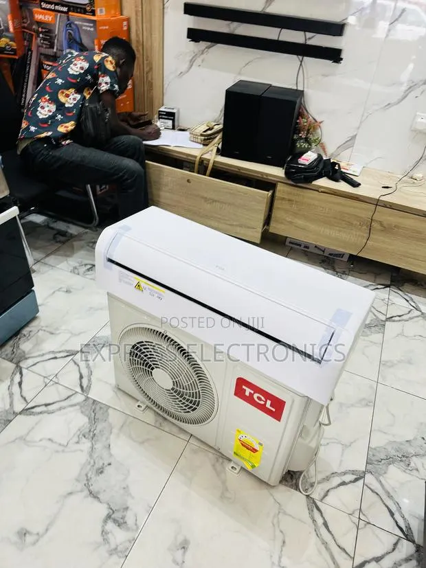 Eco Mode Function Sleek TCL 1.5hp Split R410 Gas TCL · Photo 1
