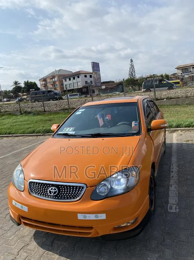 Toyota Corolla 2007 Orange · Photo 1