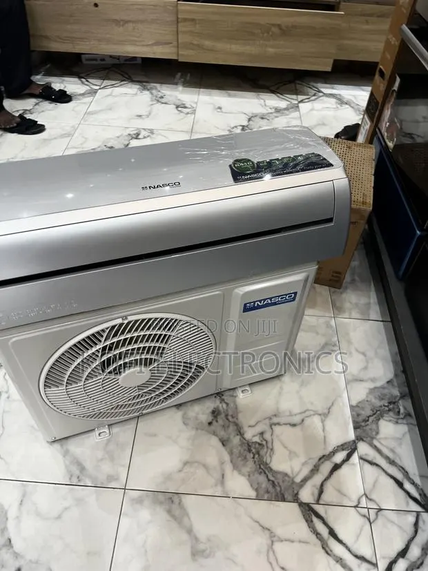 70% Energy Saving R410gas Nasco 1.5Hp AC{Silver} · Photo 1