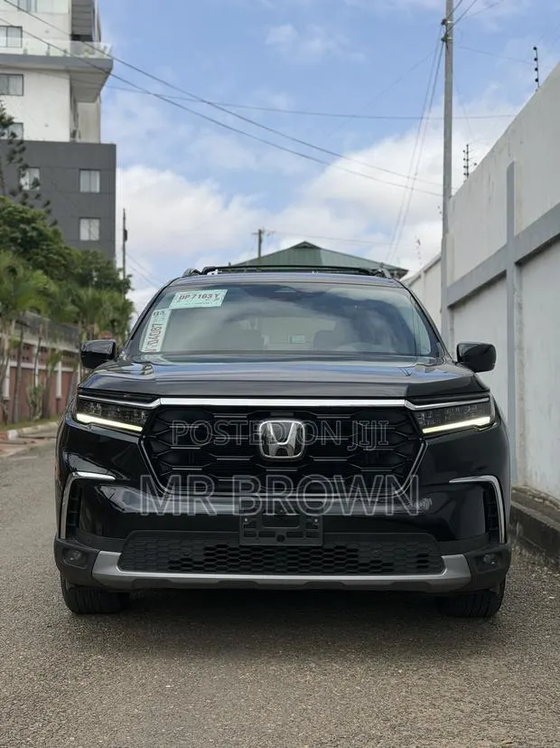 Honda Pilot Touring AWD 2024 Black · Photo 1