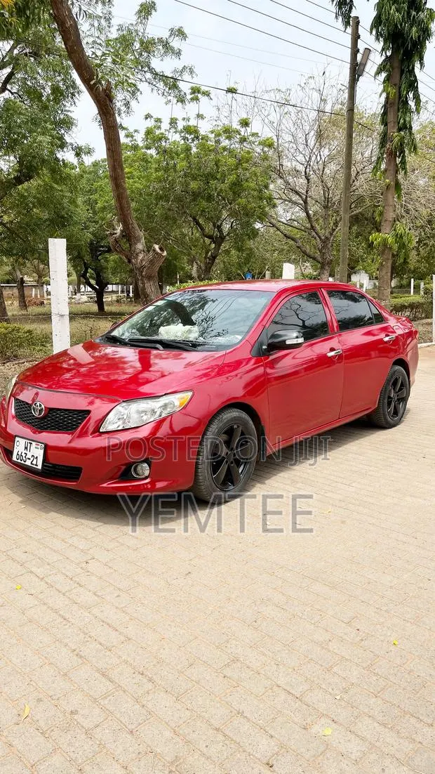 Toyota Corolla 2010 Red · Photo 1