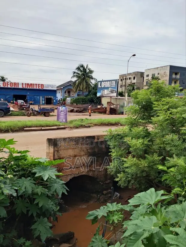 2 Plots on Main Road With an Uncompleted Structure for Sale Klagon · Photo 1