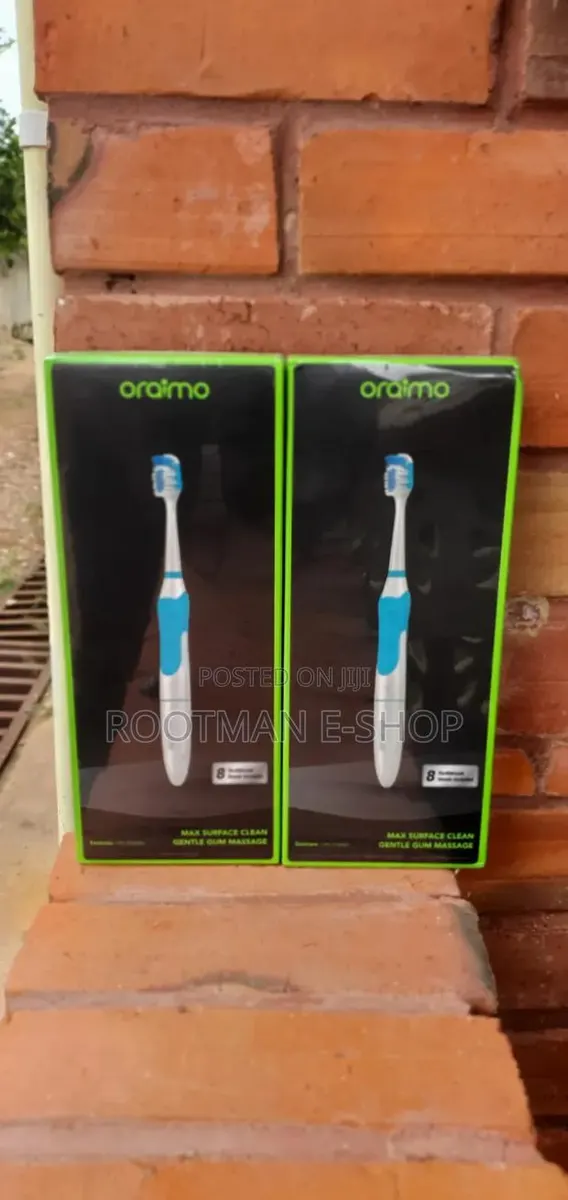 Smart Electric Brush With (8) Extra Brush Heads · Photo 1