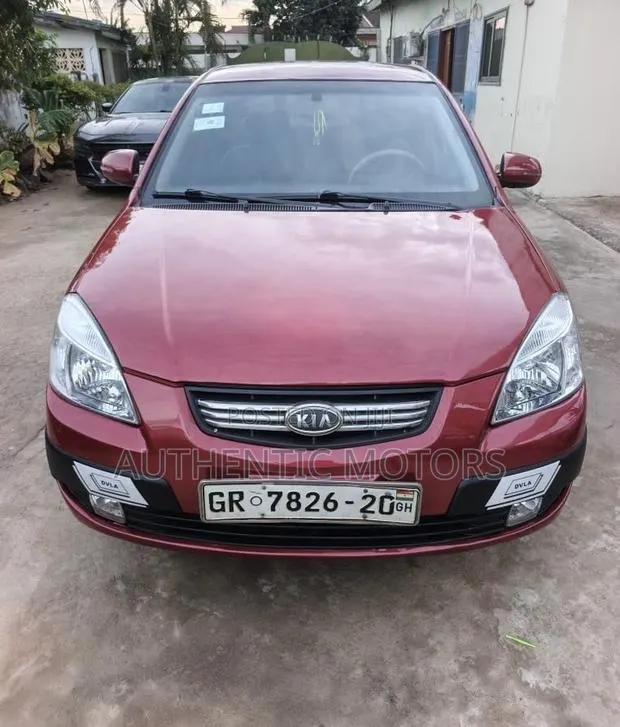 Kia Rio 2010 Red · Photo 1