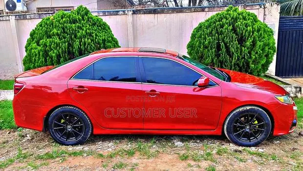 Toyota Camry XLE 4dr Sedan (2.5L 4cyl 6A) 2014 Red · Photo 1