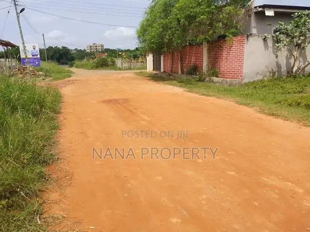 Two Plots of Land for Sale at Oyibi and Is Well Secured With Fence · Photo 1