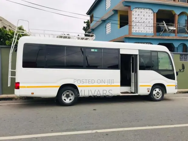 Car Rental: Toyota Coaster Bus for Hiring · Photo 1