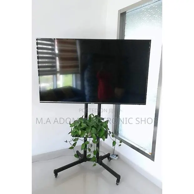 Very Durable Safe to Hang Your Tv on Tv Stand 32”-70” · Photo 1