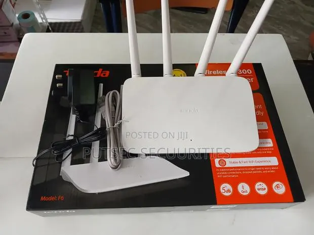 Tenda F6 Network Router · Photo 1