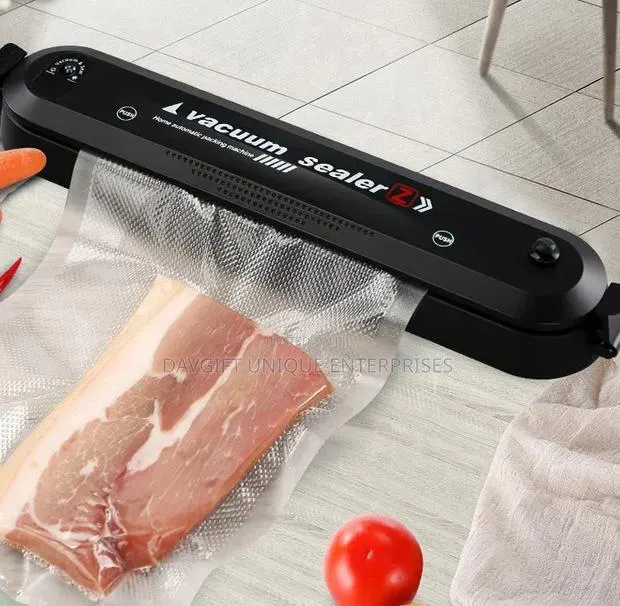 Quality Vacuum Sealer With Extra Rubber Bags · Photo 1