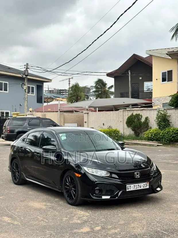 Honda Civic EX-L w/Navi 4dr Hatchback (1.5L 4cyl) 2017 Black · Photo 1