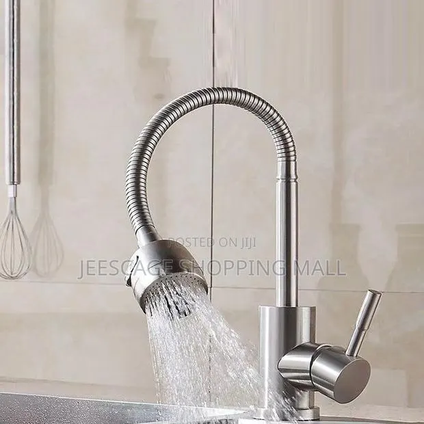 Chrome Single Handle Kitchen Faucet With Flexible Sprayer · Photo 1