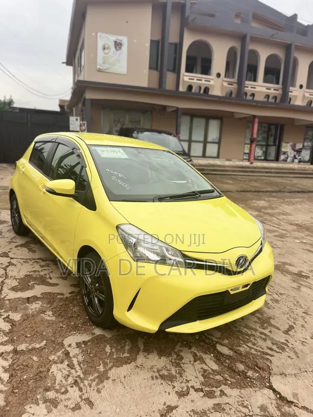Toyota Vitz 1.3 FWD 5dr 2015 Yellow · Photo 1