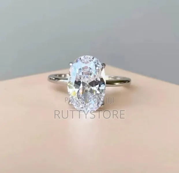 Sterling Engagement Ring (Free Case) · Photo 1