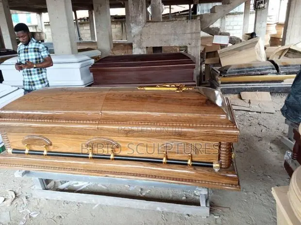 Polished Hardwood-Finish Casket · Photo 1
