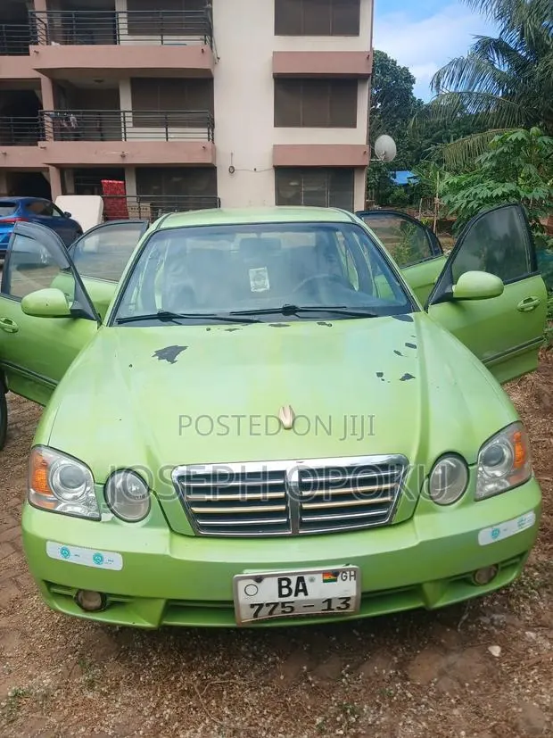 Kia Rondo 2004 Green · Photo 1