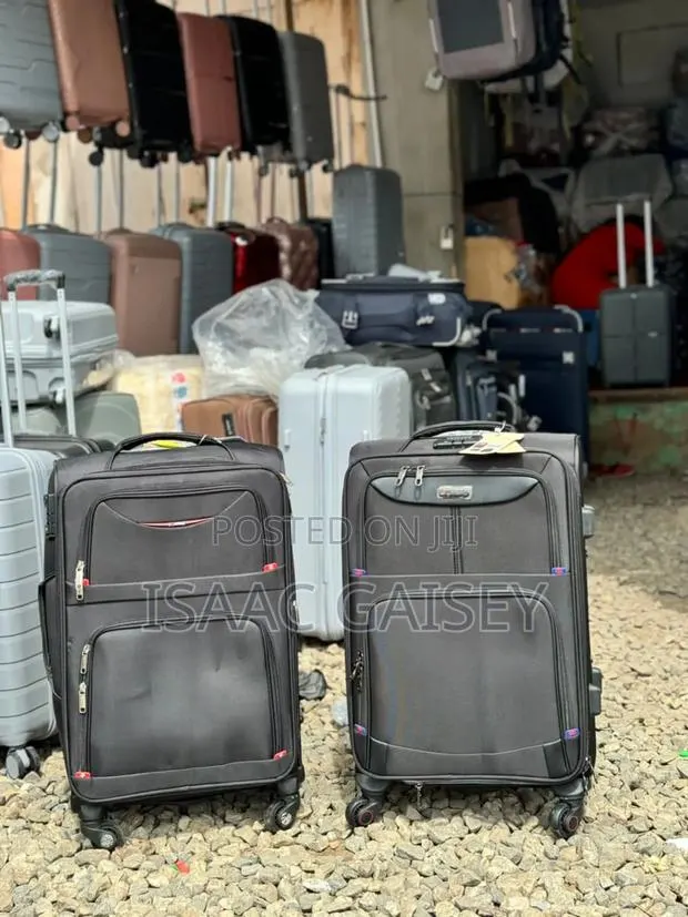 24" Quality Medium Size Material Luggages · Photo 1