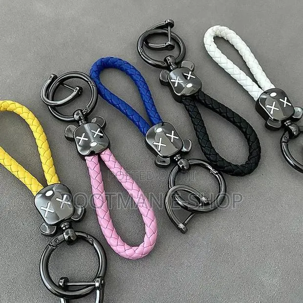 Braided Leather Keychain With a Teddy Bear Head for Car and Bag Keys · Photo 1