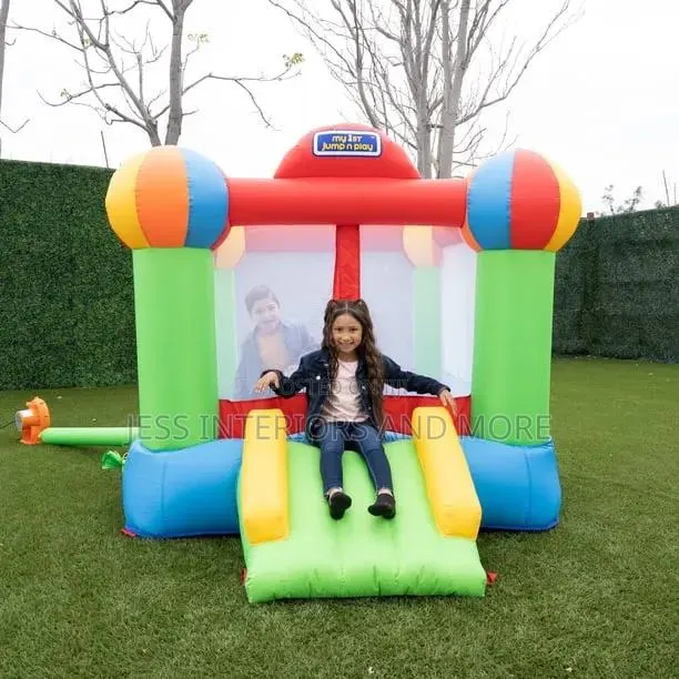 Inflatable Bounce House With Slide · Photo 1