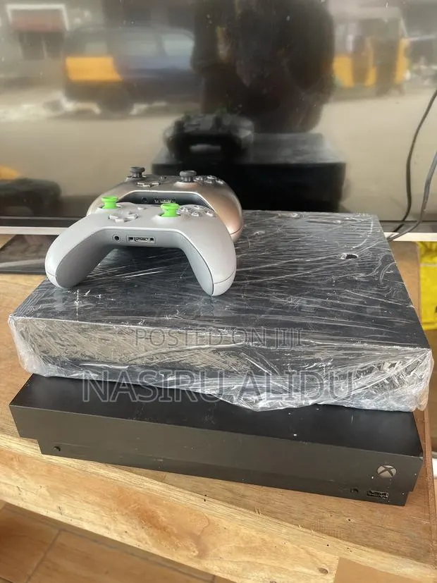 Xbox One X UHD With 20 Plus Games,FOREIGN USE · Photo 1